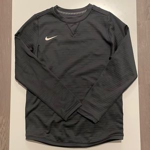 Kids Nike long sleeve crew neck sweatshirt.